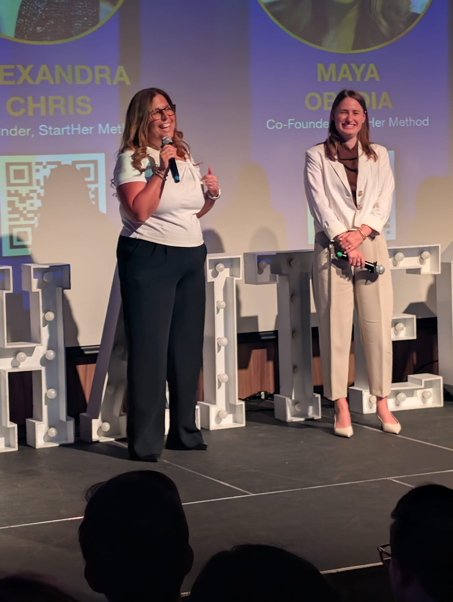 Alexandra Chris and Maya Obadia speaking together on stage